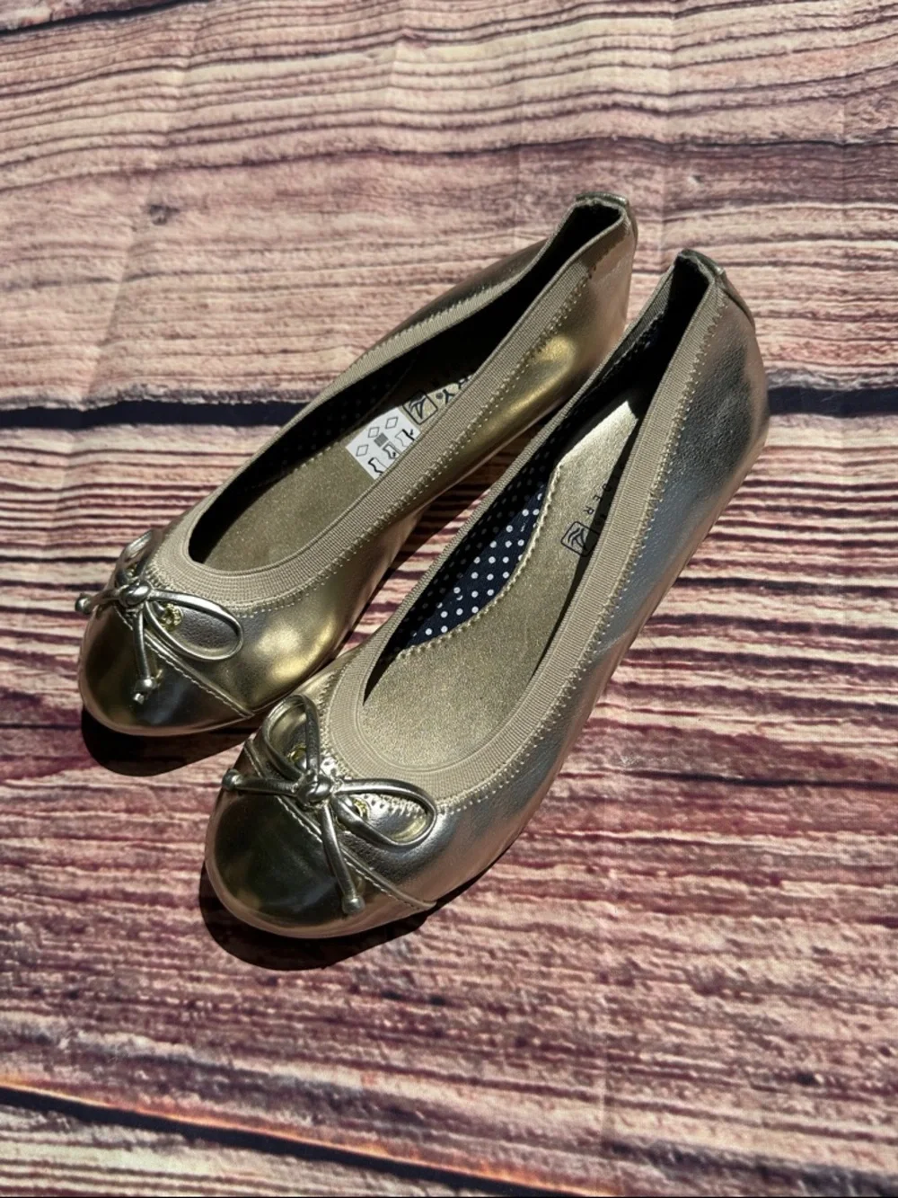 Sperry girl’s Metallic Gold Ballet Flats with Bow
